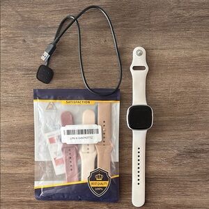 Fitbit Versa 4 watch with extra bands